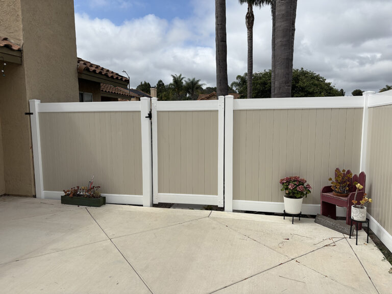 Solid white vinyl privacy fencing